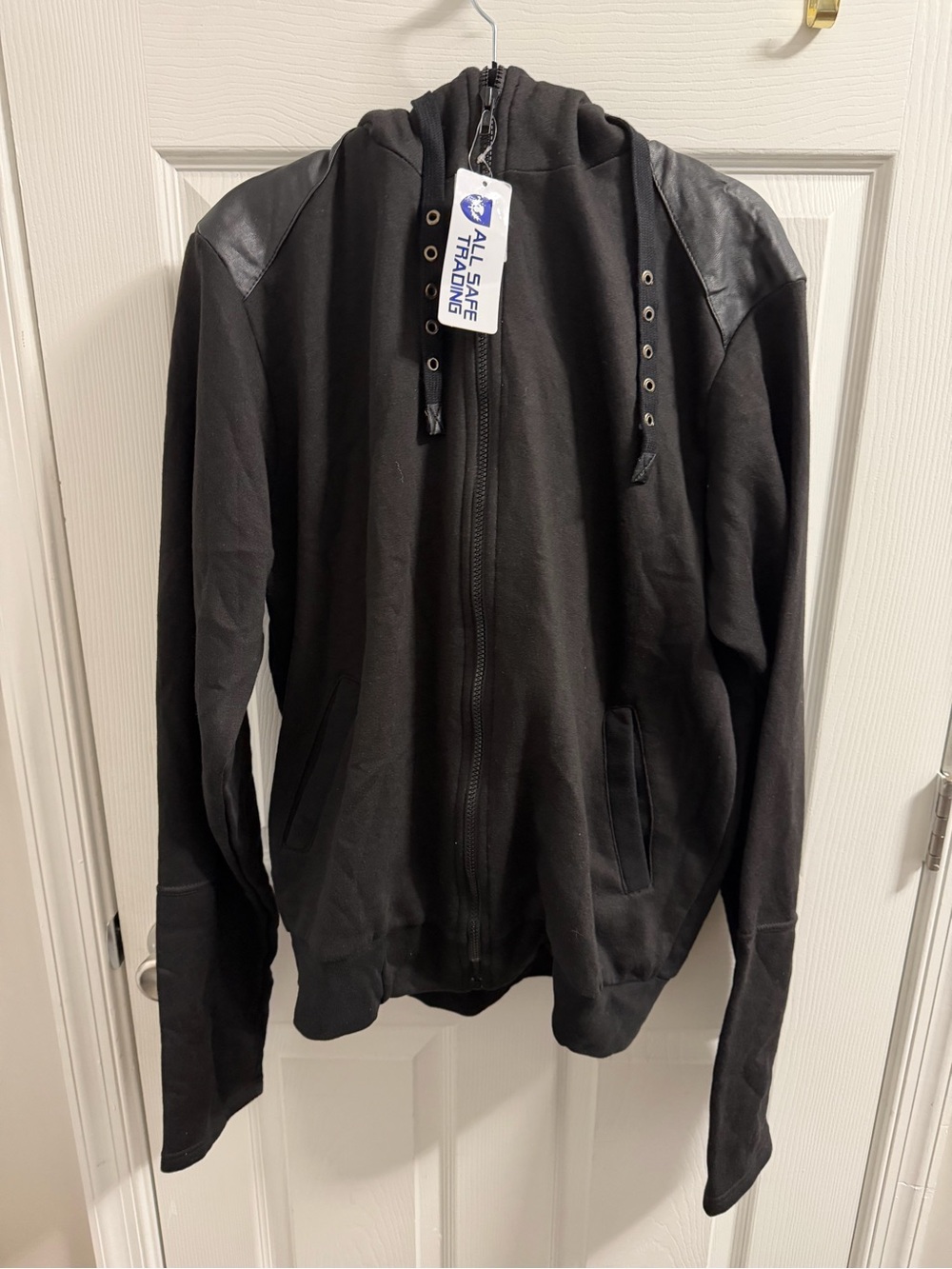 Punk Rave black fleece zip-up hoodie with prominent faux-leather spikes on hood